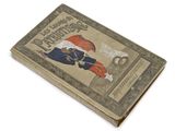 un vieux livre sur lequel figure l'image d'un homme tenant un parapluie