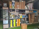 a room with a lot of boxes and boxes on the shelves