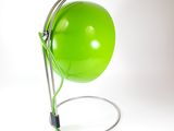 a green lamp that is connected to a green cord