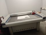 une image d'une machine servant à découper du papier