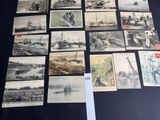 a lot of old photos of ships and boats on display