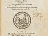 an old book with a picture of a rooster on it