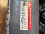a close up of a water heater on a table