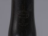 a close up of a baseball bat on a gray background