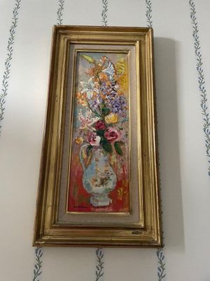 a painting of flowers in a vase on a wall