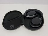 a black case with a pair of headphones inside of it