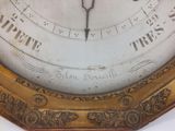 a clock that is on the wall of a building
