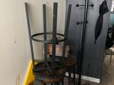 two chairs and a table in a room with a door
