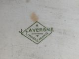 a close up of a plate with a logo on it