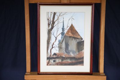 une photo d'un tableau représentant une église, dans un cadre