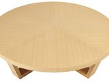 an image of a wooden table with four legs and a circular top