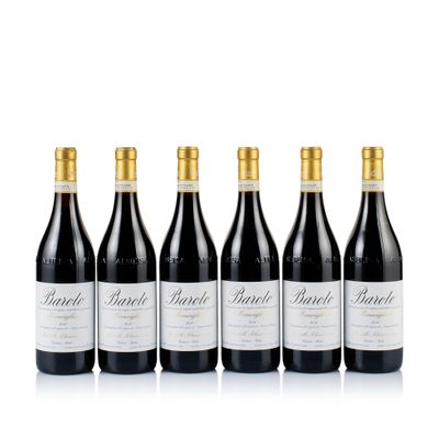 six bottles of red wine lined up in a row