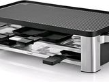 une image représentant un grille-pain surmonté d'une grille