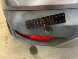 a close up of a sticker on the back of a car