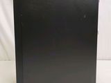 an image of a black box sitting on top of a white table
