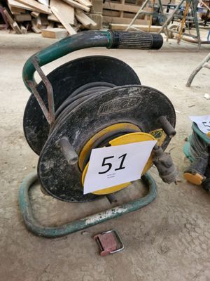 a hose that is sitting on the ground with a number 51 on it