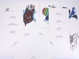 several cards with different designs on them on a white surface