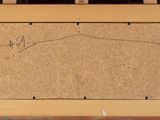 an image of a painting on a easel with a wooden frame