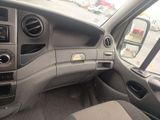 a dashboard of a truck with a steering wheel