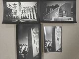 four black and white photographs of a building with a clock on top of it