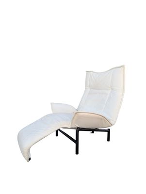 an image of a white reclining chair with a pillow on it
