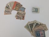a lot of old money sitting on a table