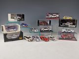 many different models of cars in a display case