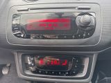 a car dashboard with a digital clock on it