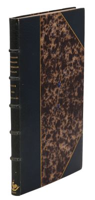 an old book with a leopard print cover and a black binding