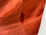 a close up of a piece of fabric with a hole in it
