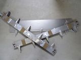 a metal plane that is laying on the floor