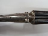 a close up of a pair of scissors on a white surface
