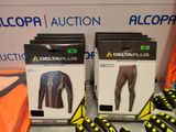 two boxes of deltaplus clothing are on display in a store