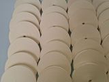 several rolls of paper are stacked on top of each other on a table