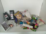 a pile of assorted items sitting on a counter