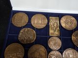 a lot of coins that are in a box
