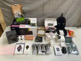 a lot of electronic items that are on a table