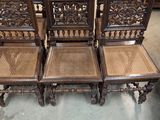 four antique chairs with cane back and cane seats