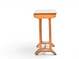 an old wooden table with a marble top on a white background