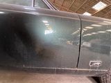 an image of a car that is in a garage