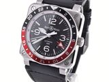 a black and red watch on a black leather strap