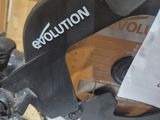 someone is using a circular saw to cut a piece of wood
