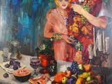 tableau représentant une femme tenant un enfant dans ses bras devant une table couverte de fruits