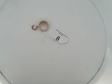 a white plate with a pair of scissors on it