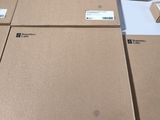 several boxes are stacked on top of each other on a table