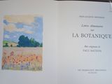 un livre sur lequel figure l'image d'un champ de fleurs