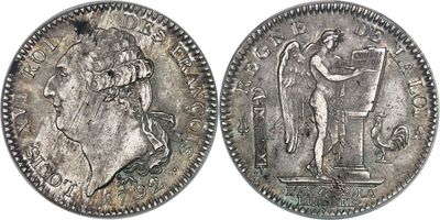 une pièce de monnaie en argent portant l'image d'un homme et d'une femme