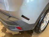a picture of a car that has been painted silver