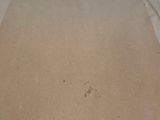 a cardboard box that has a piece of paper on it