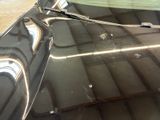 a close up of a car ' s windshield with a broken windshield